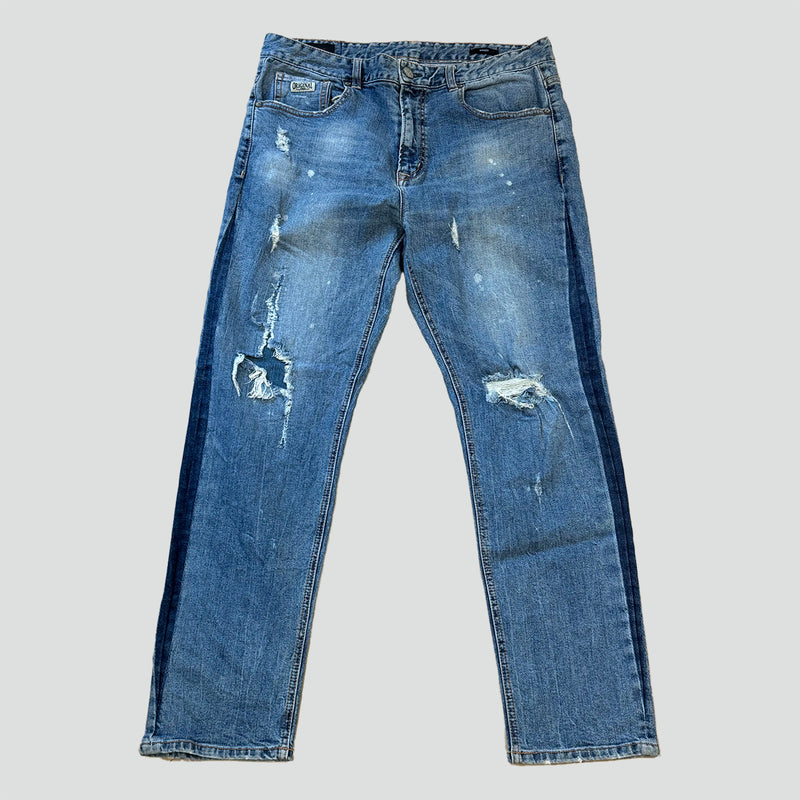 Detailansicht: Sourced limited accessories and clothes Ripped Evisu baggy jeans – Logo, Nähte oder Material