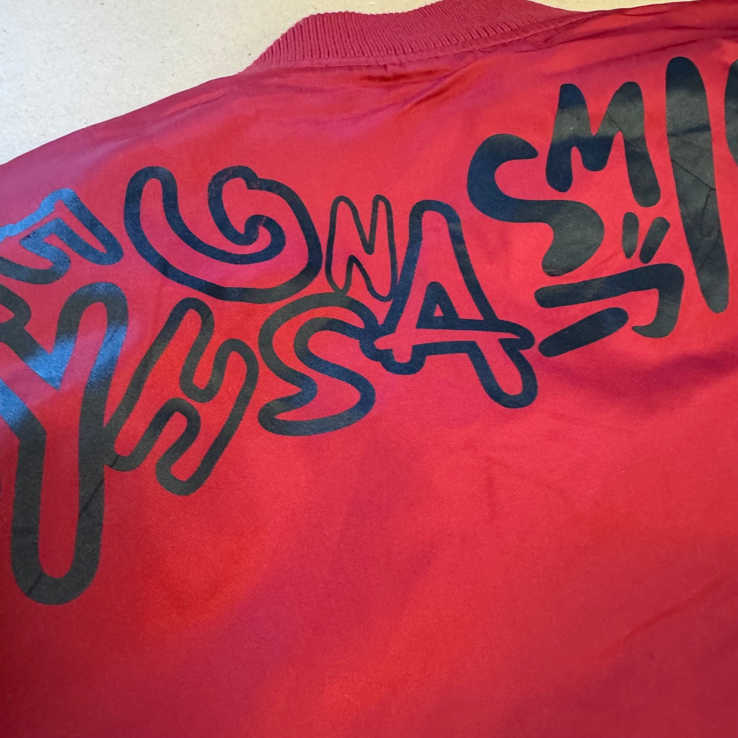 Evisu Alphabet red bomber raincoat