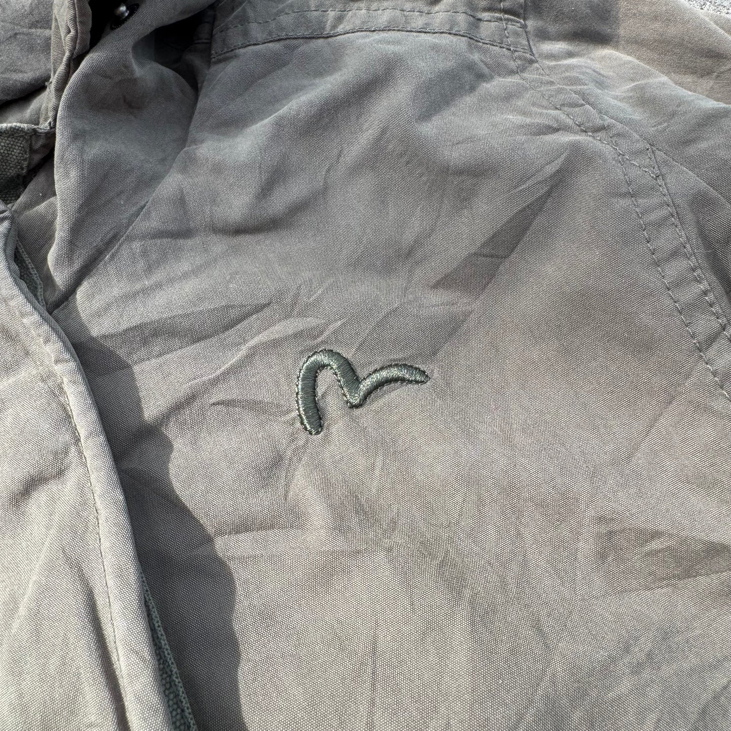 Unique Evisu green raincoat