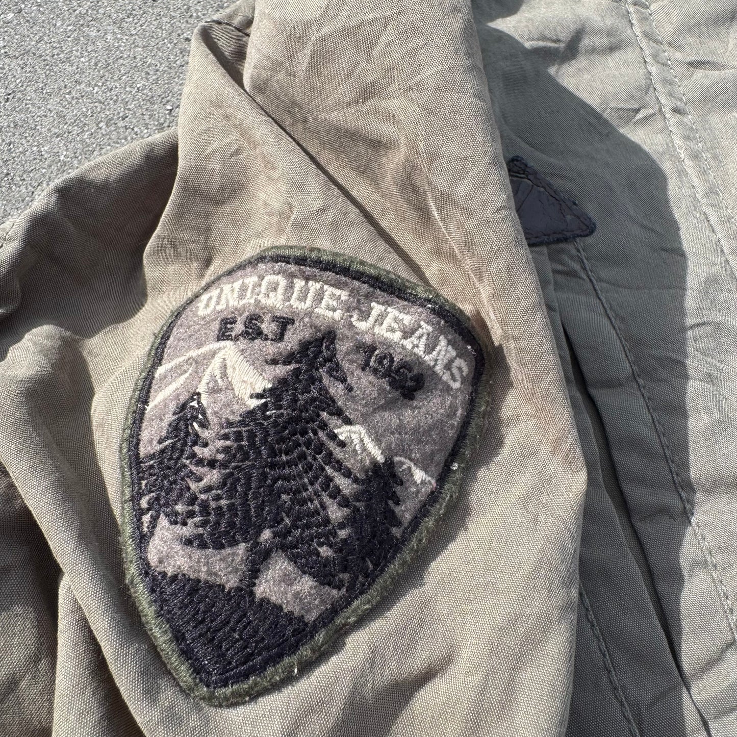 Unique Evisu green raincoat