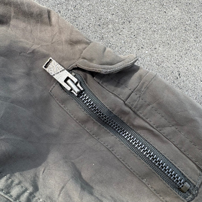 Detailansicht: Sourced limited accessories and clothes Unique Evisu green raincoat – Logo, Nähte oder Material