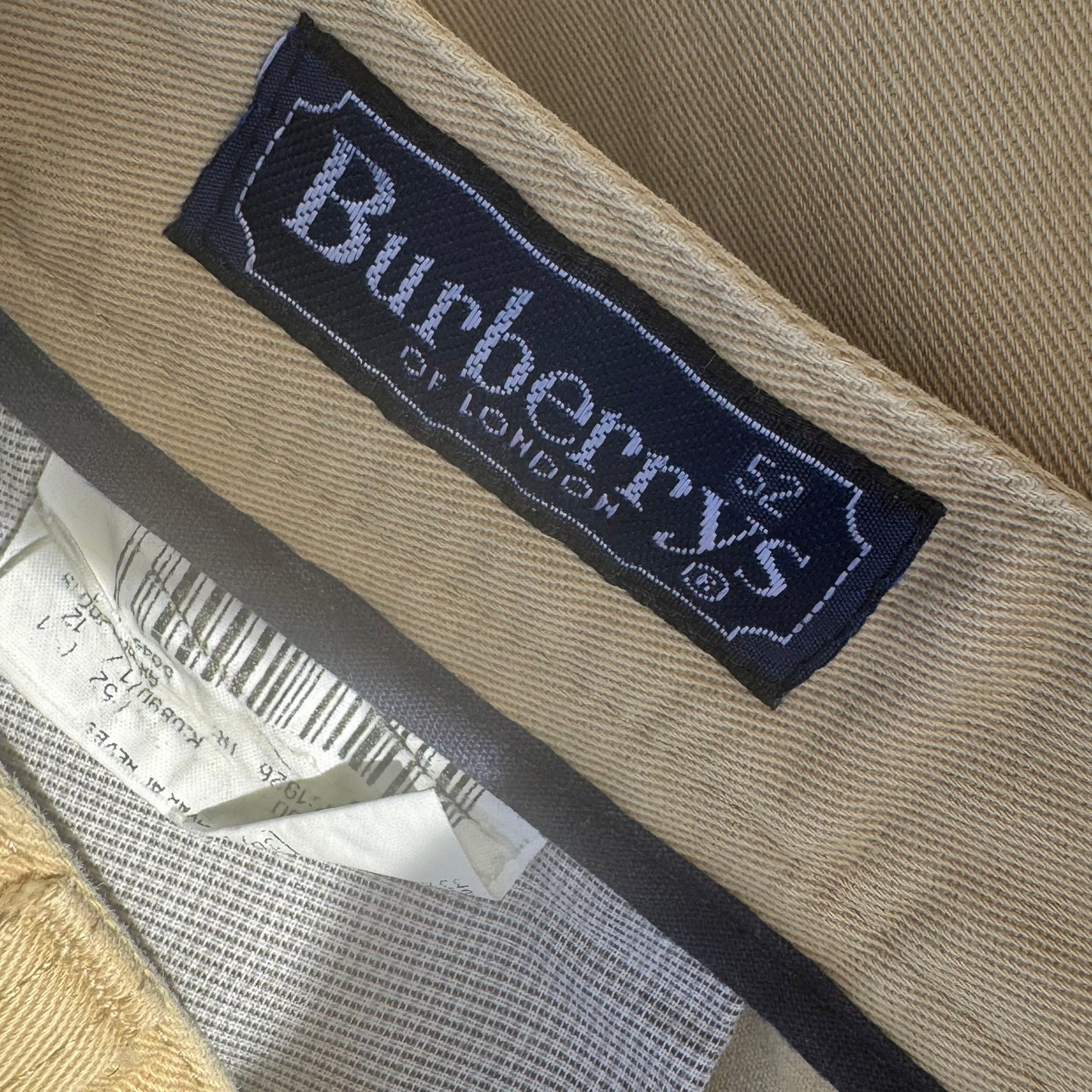 Burberry's beige baggy trousers