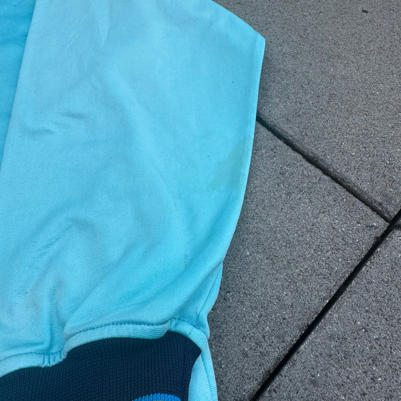 Detailansicht: Sourced limited accessories and clothes Kappa turquoise vintage track jacket – Logo, Nähte oder Material