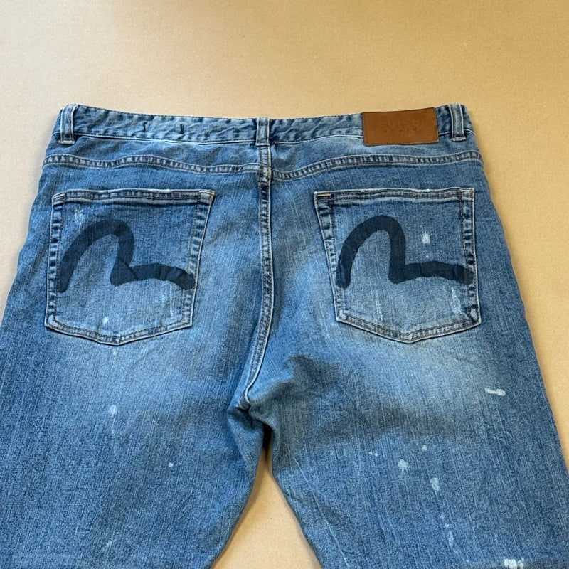 Detailansicht: Sourced limited accessories and clothes Ripped Evisu baggy jeans – Logo, Nähte oder Material