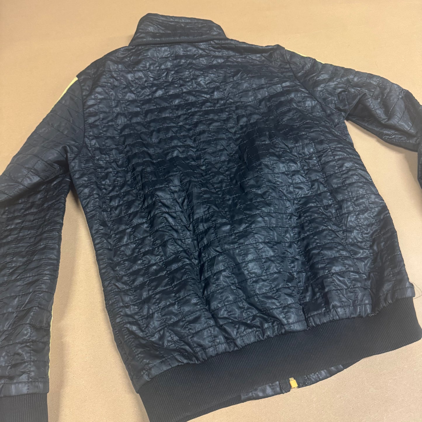 Adidas y2k-style black and golden rainjacket