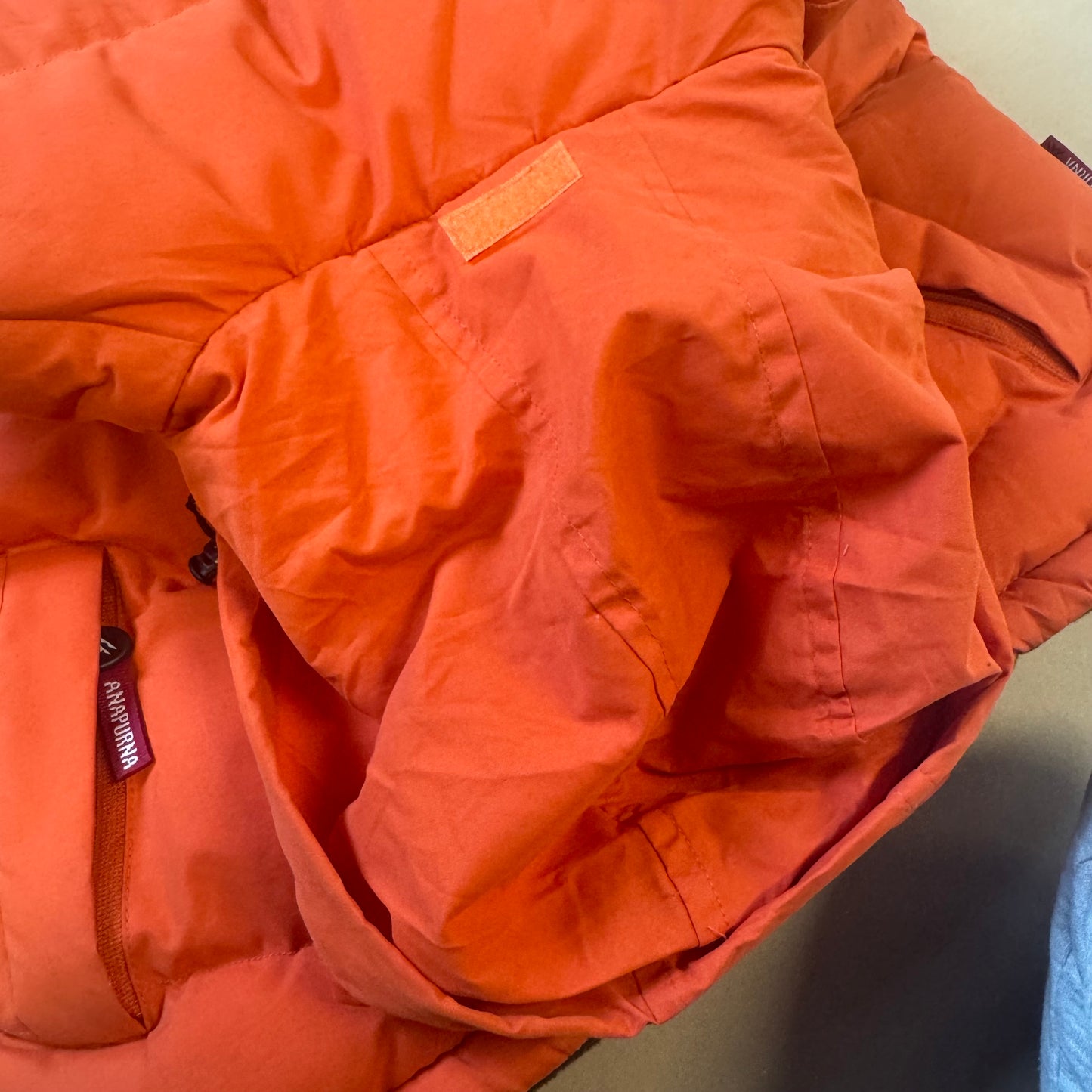 Anapurna orange puffer vest