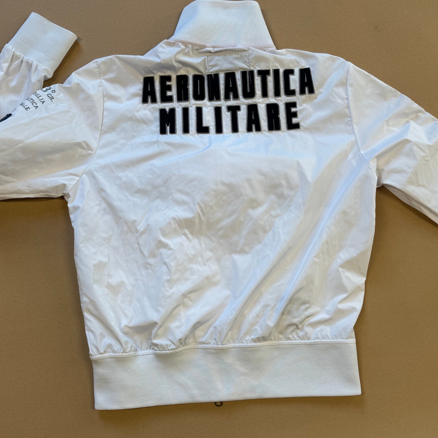 Aeronautica Militare white raincoat