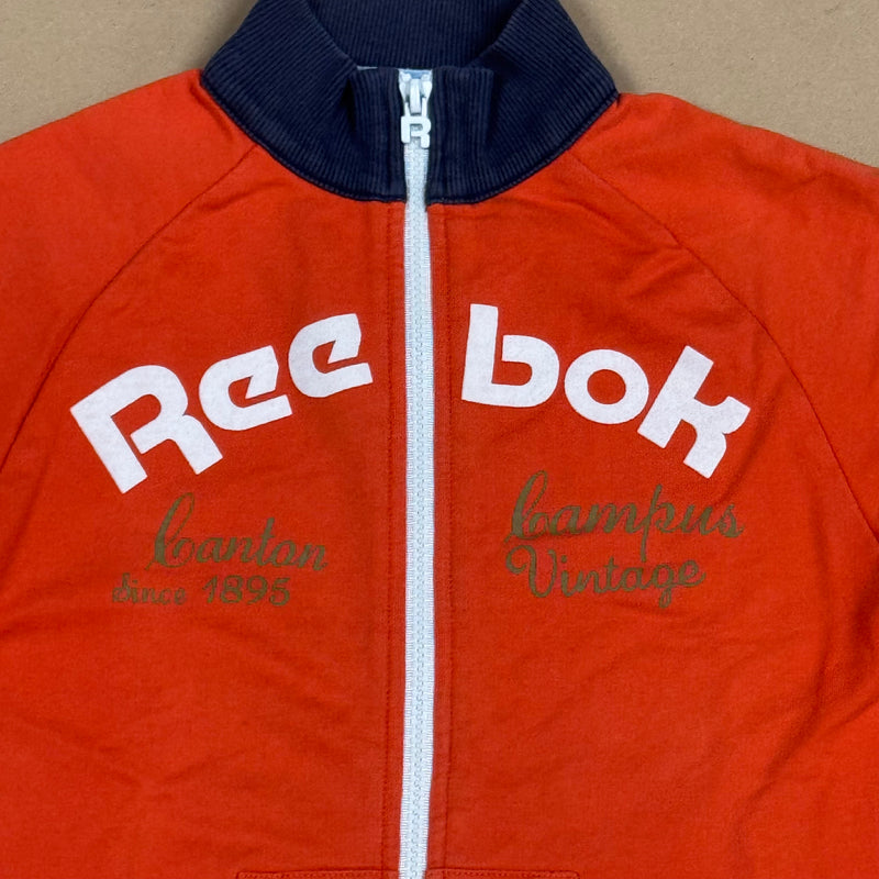 Detailansicht: Sourced limited accessories and clothes Reebok orange vintage zip-up – Logo, Nähte oder Material