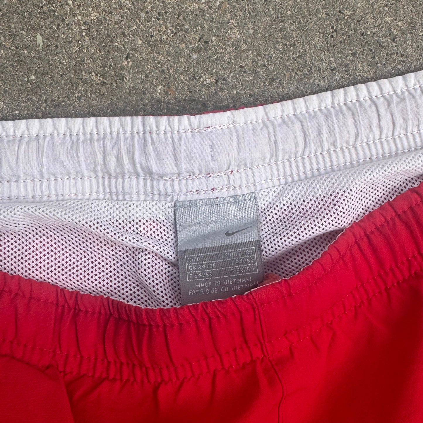 Nike vintage red bathing shorts