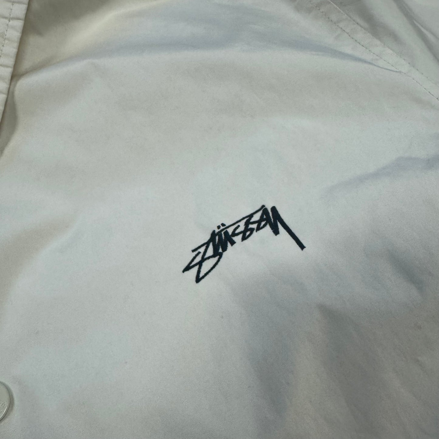 Stüssy vintage cream raincoat