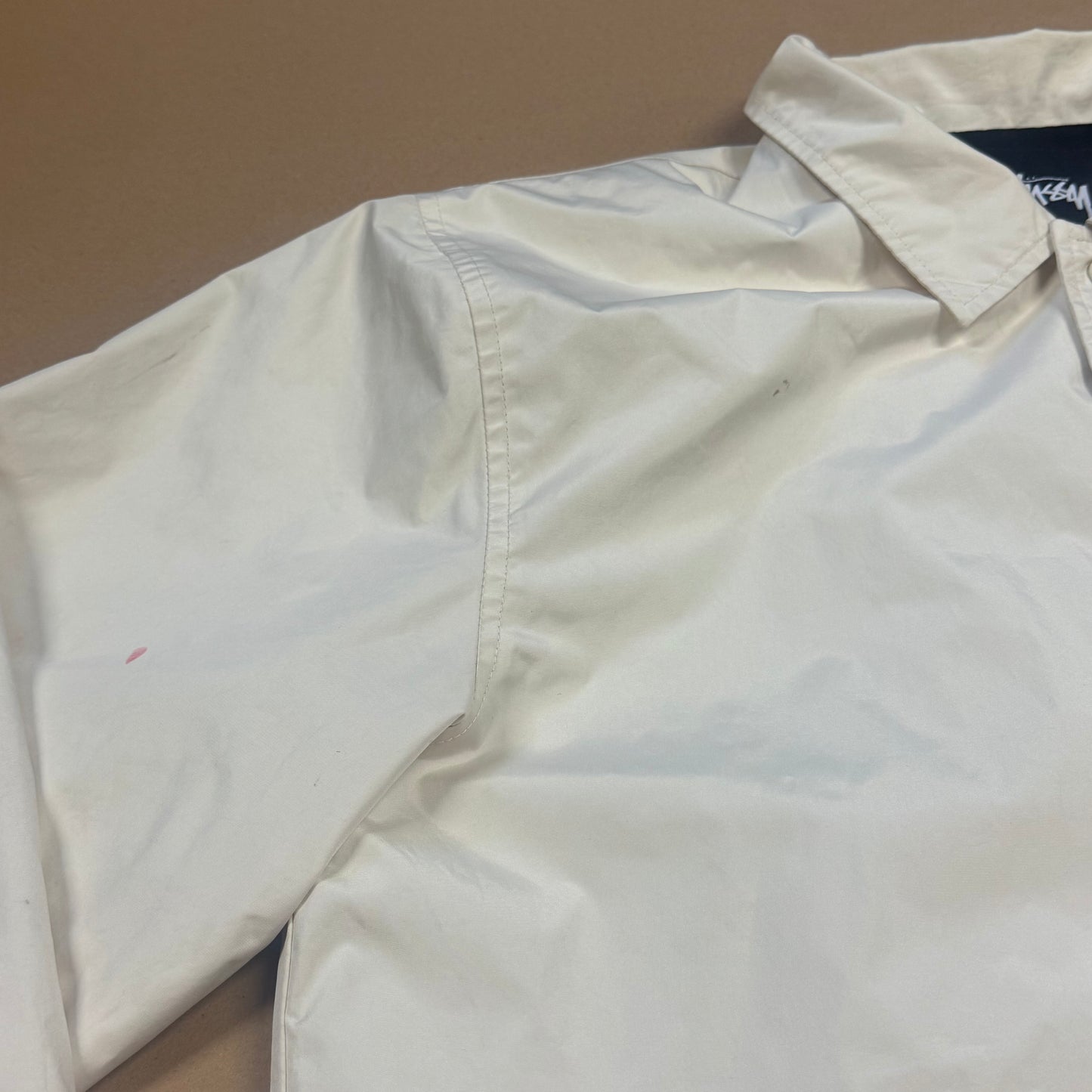 Stüssy vintage cream raincoat