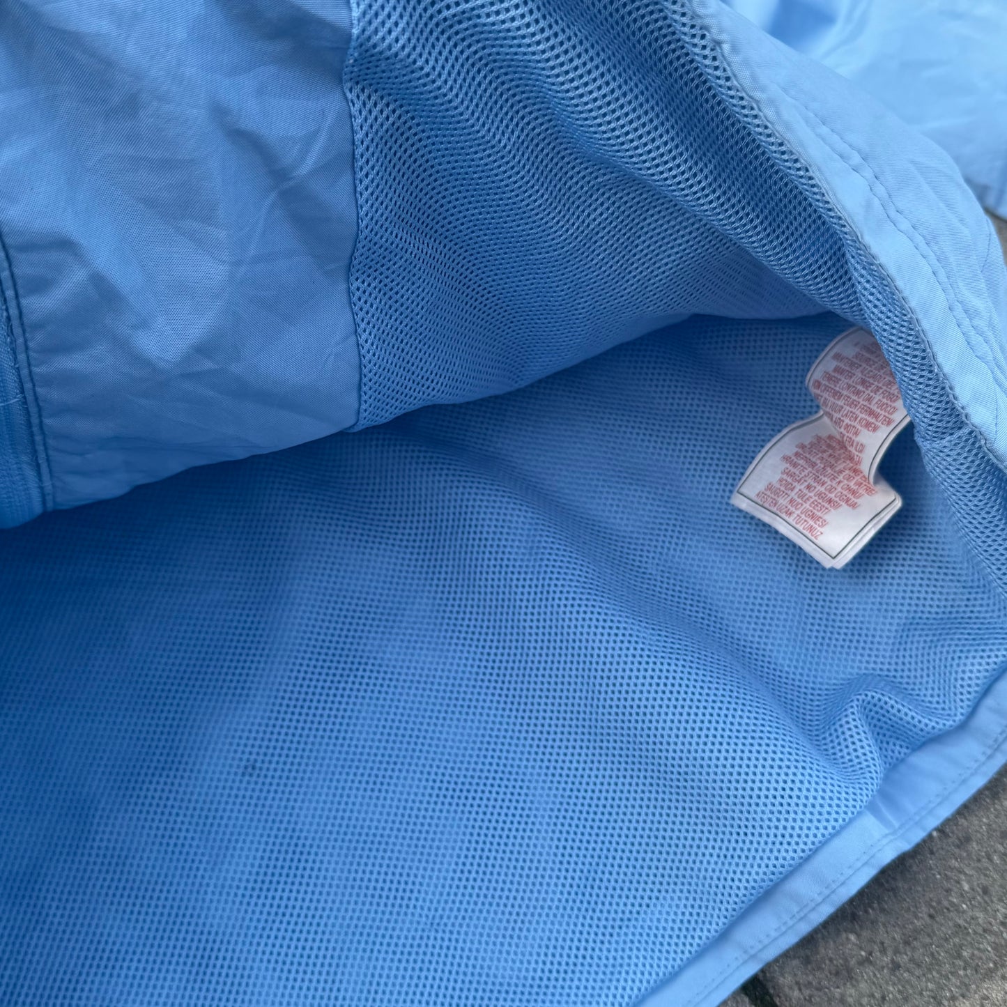 Vintage Nike lightweight blue track jacket