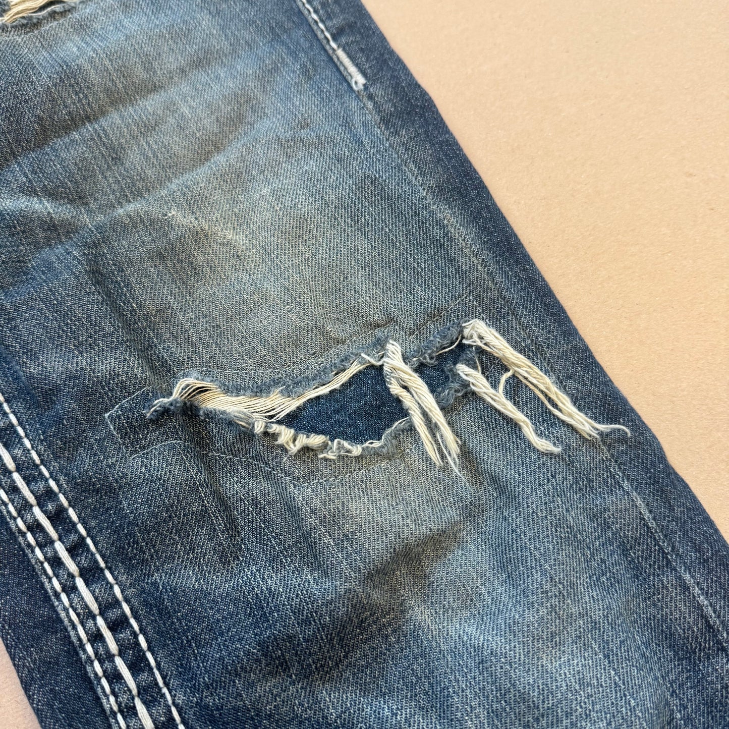 True Religion ripped & reworked jeans