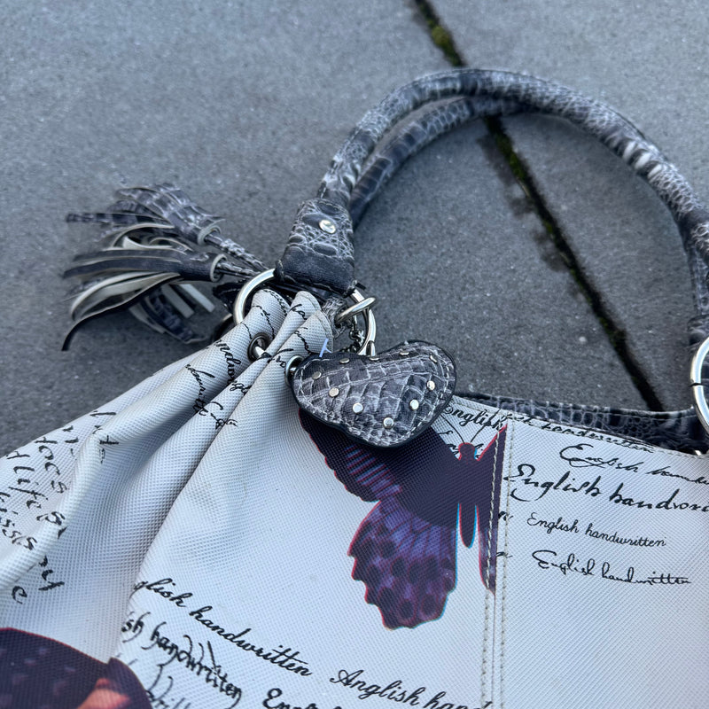 Detailansicht: Sourced limited accessories and clothes Vintage Butterfly womens handbag – Logo, Nähte oder Material