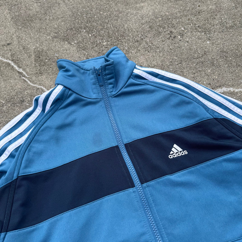 Detailansicht: Sourced limited accessories and clothes Adidas vintage 90s blue track jacket – Logo, Nähte oder Material