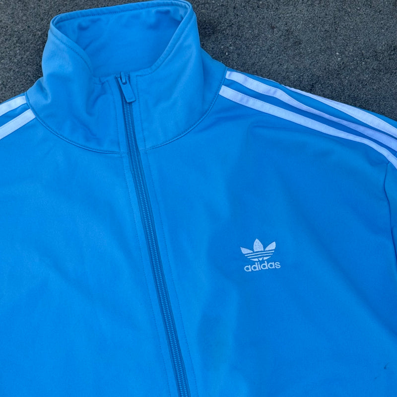 Detailansicht: Sourced limited accessories and clothes Adidas vintage skyblue track jacket – Logo, Nähte oder Material