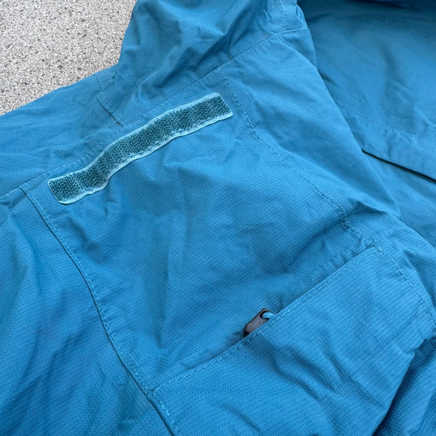 The North Face blue rain jacket