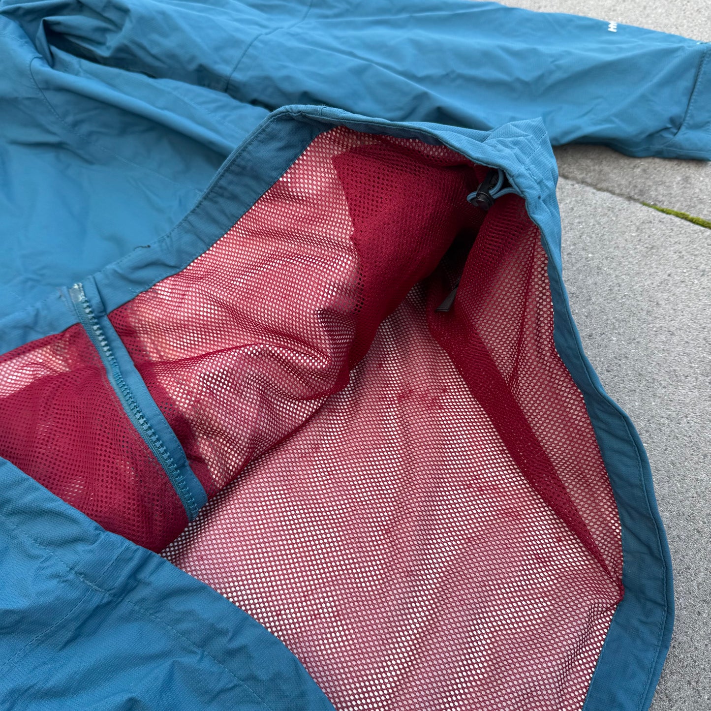 The North Face blue rain jacket