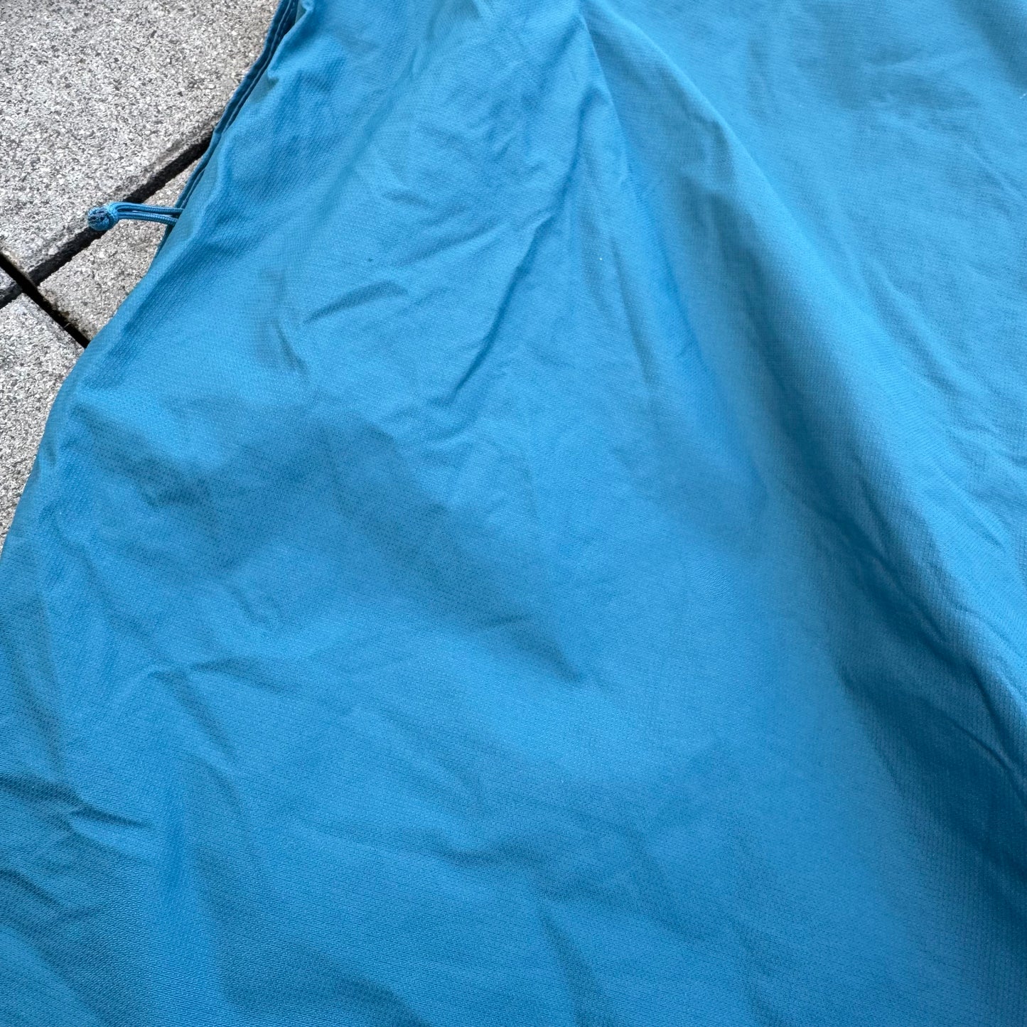 The North Face blue rain jacket