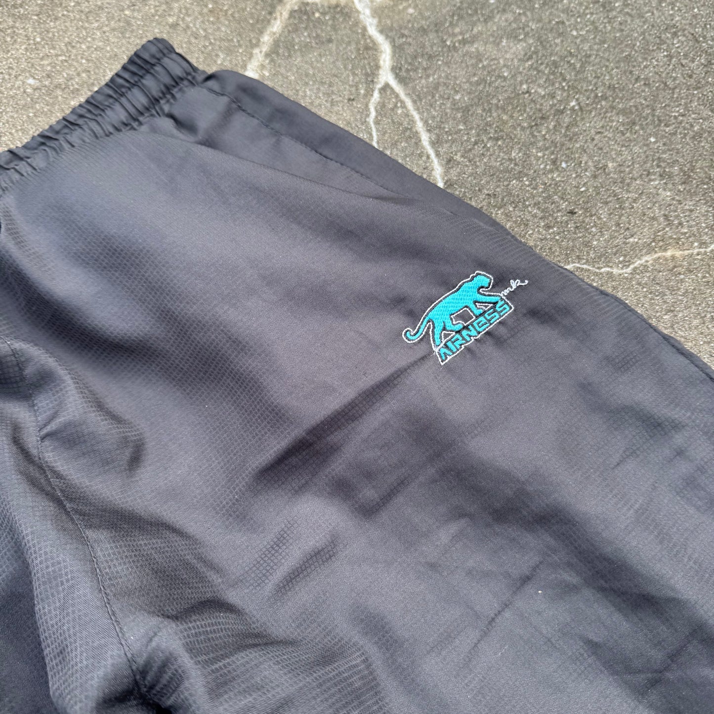 Airness streetwear style black baggy track pants