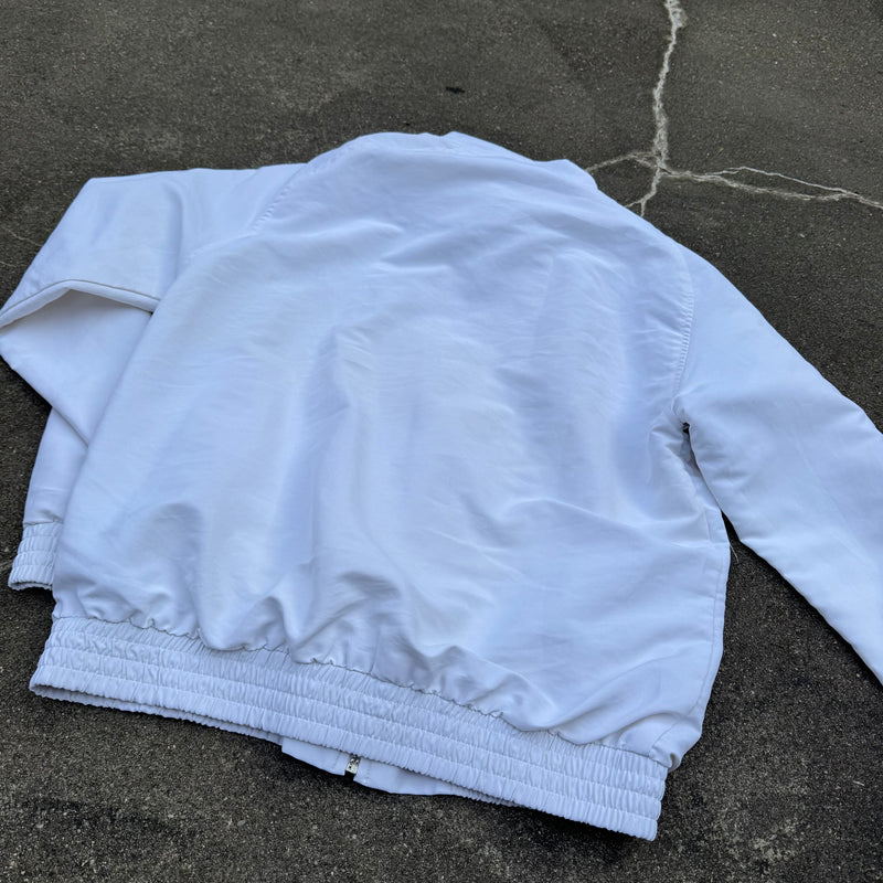 Detailansicht: Sourced limited accessories and clothes Airness silver panther streetwear track jacket – Logo, Nähte oder Material