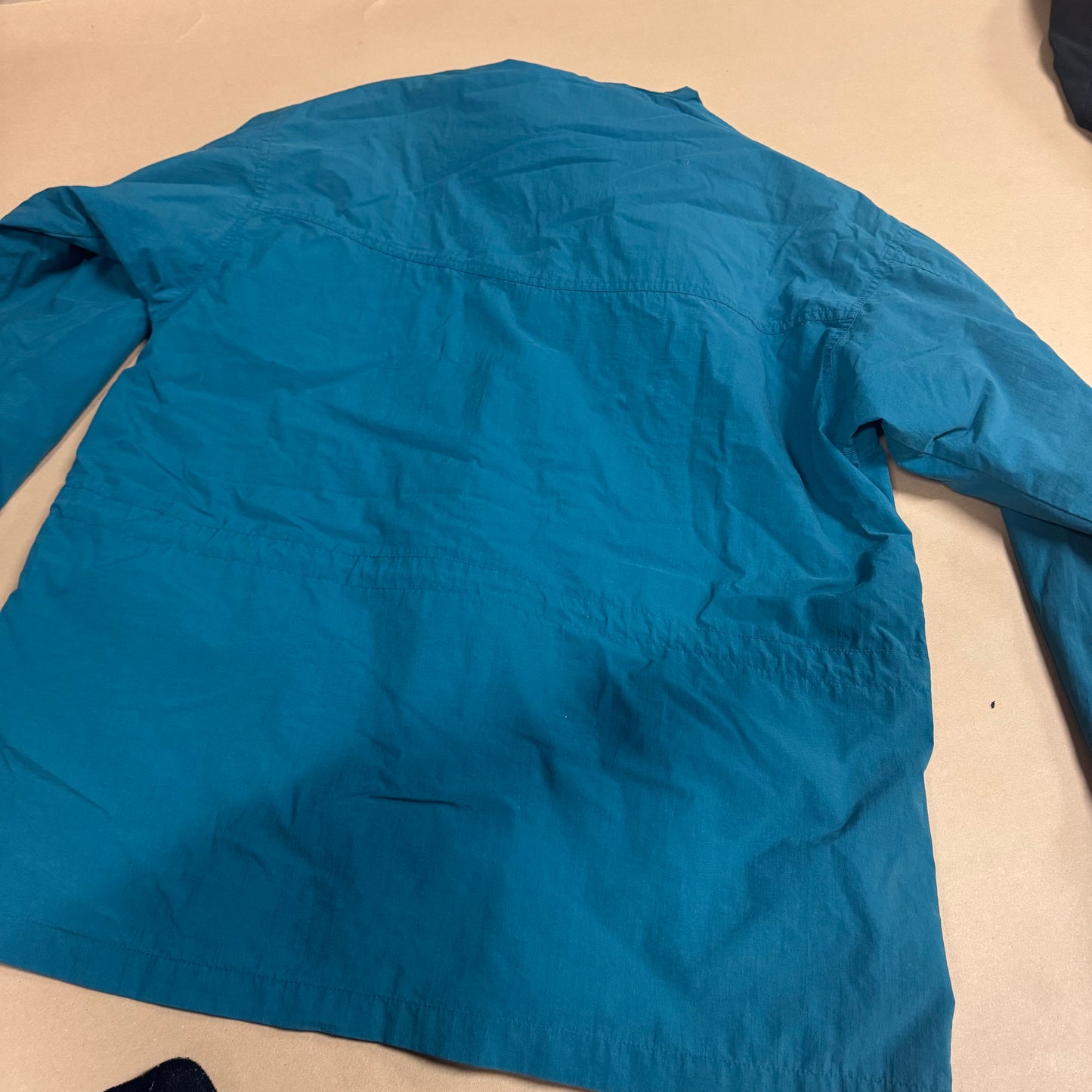 Columbia turquoise raincoat