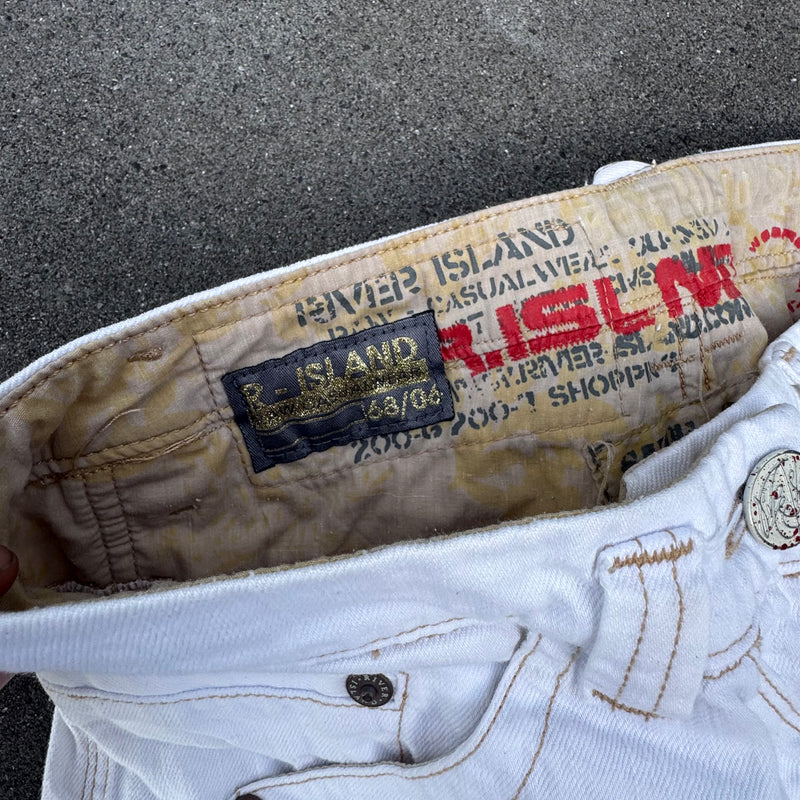 Detailansicht: Sourced limited accessories and clothes River Island white bootcut jeans retro – Logo, Nähte oder Material