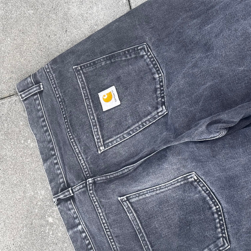 Detailansicht: Sourced limited accessories and clothes Carhartt black baggy retro jeans – Logo, Nähte oder Material