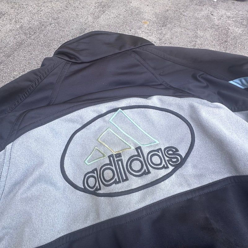 Detailansicht: Sourced limited accessories and clothes Adidas 90s vintage black track jacket used – Logo, Nähte oder Material