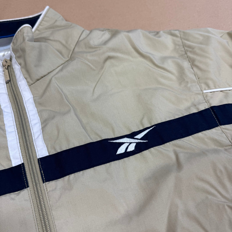 Detailansicht: Sourced limited accessories and clothes Reebok vintage beige track jacket – Logo, Nähte oder Material