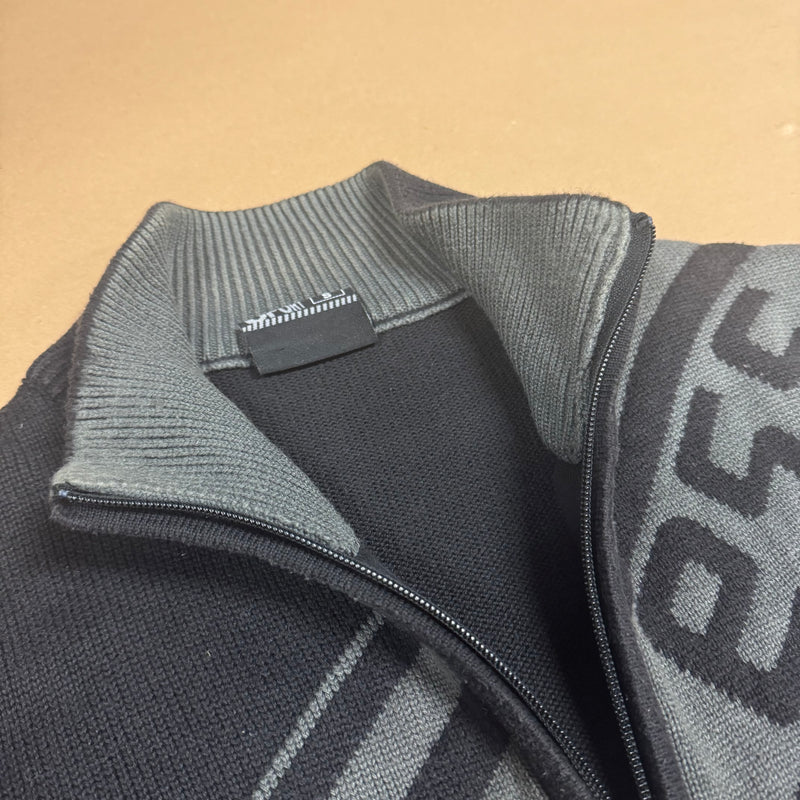 Detailansicht: Sourced limited accessories and clothes Airness vintage black knitted oversized jacket – Logo, Nähte oder Material