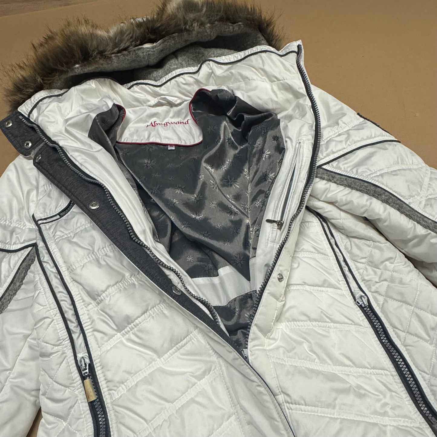 Almgwand white functional winter jacket