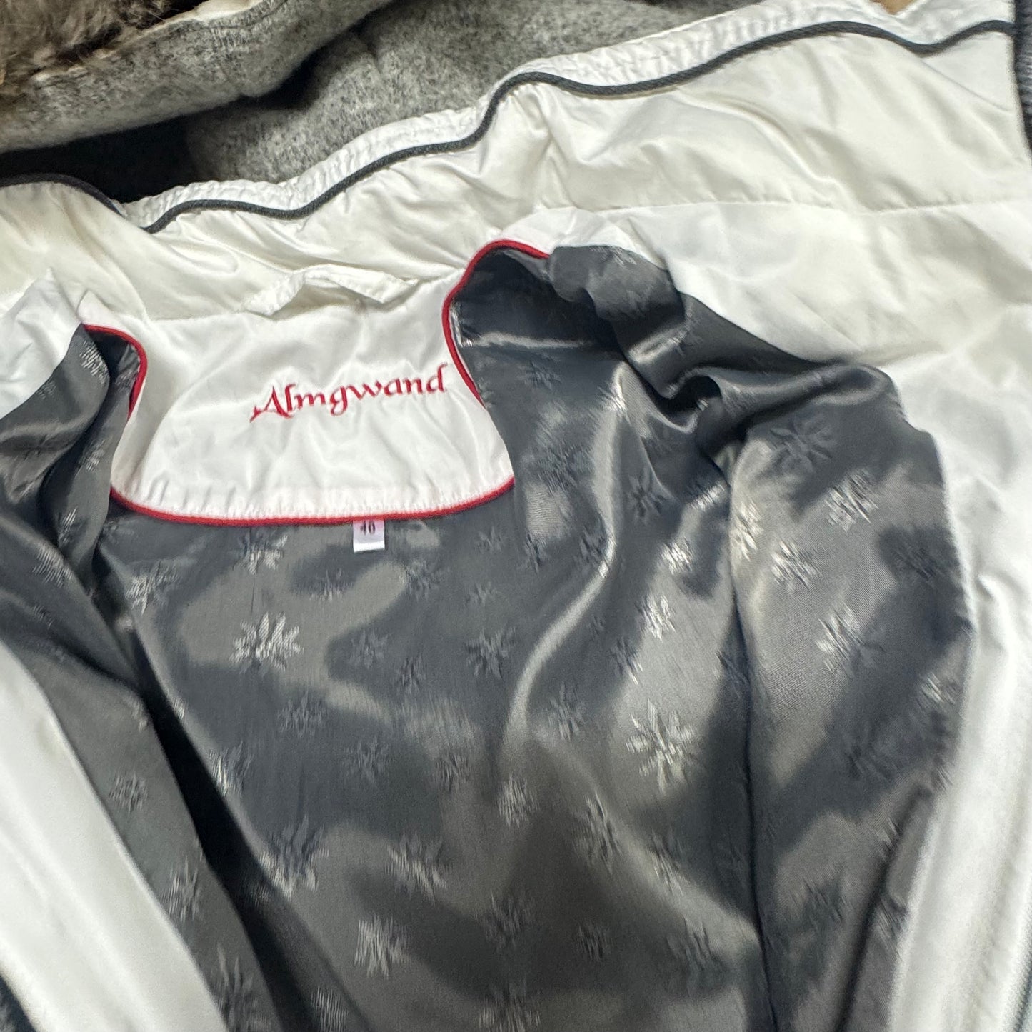 Almgwand white functional winter jacket