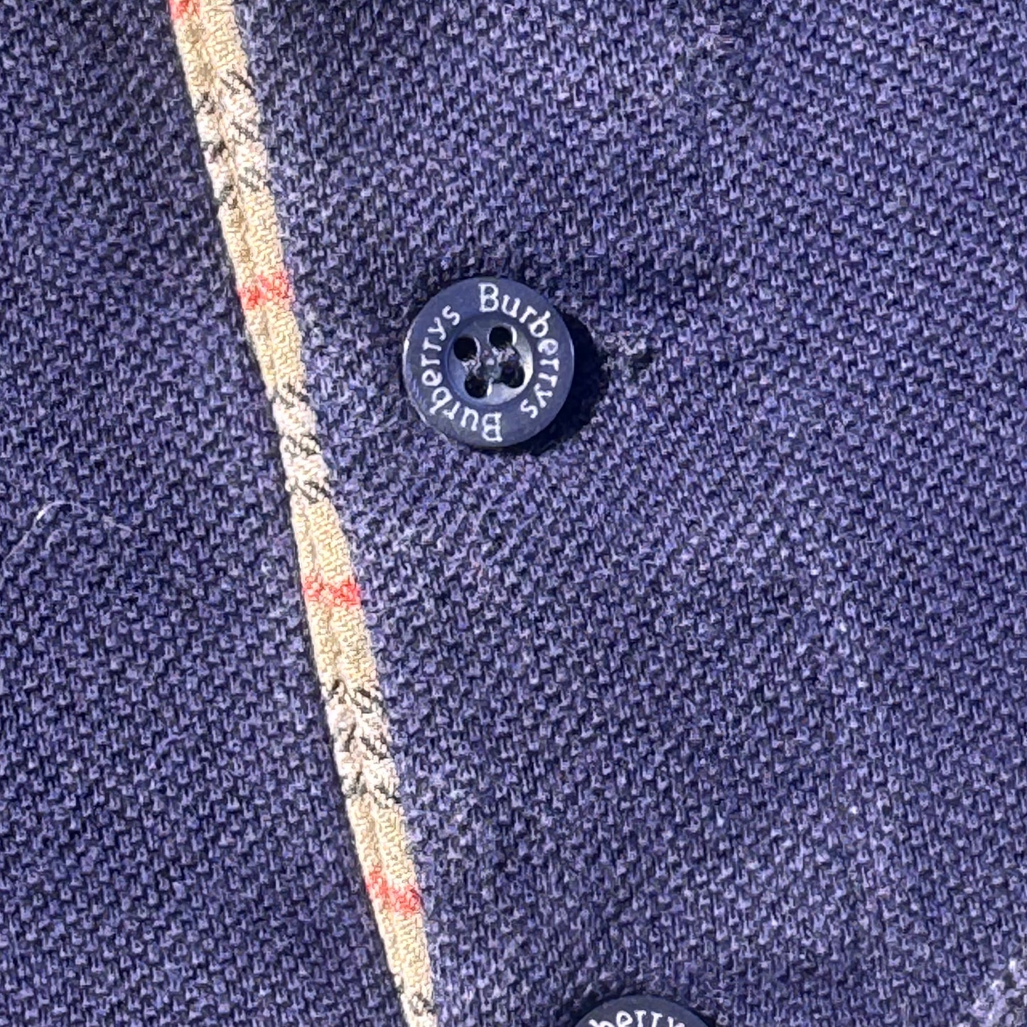 Burberry's of London vintage navy blue poloshirt