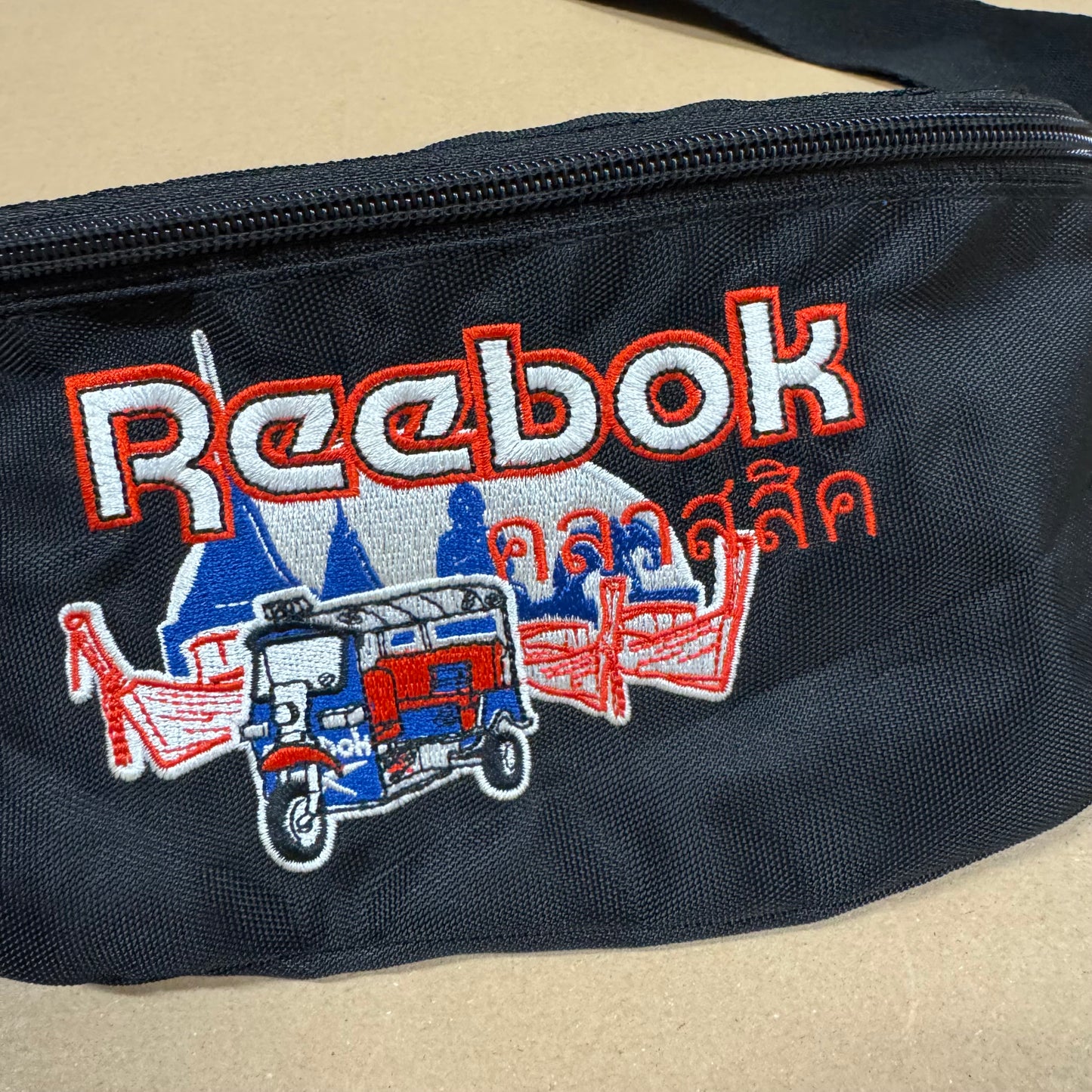 Reebok stitched black waist bag