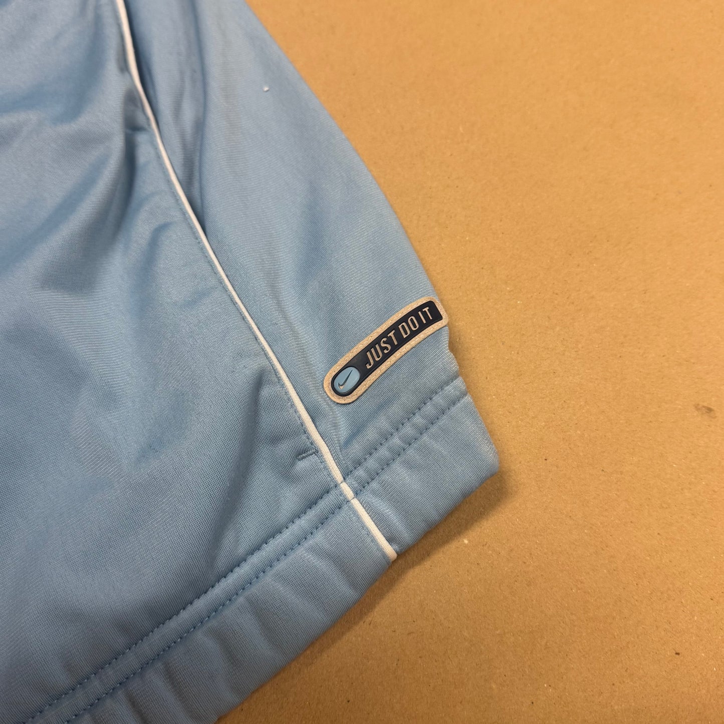 Nike “Just Do It” sky blue vintage track jacket