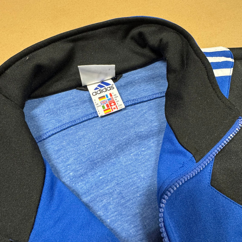 Detailansicht: Sourced limited accessories and clothes Adidas vintage “sapeurs pompiers” 90s track jacket – Logo, Nähte oder Material