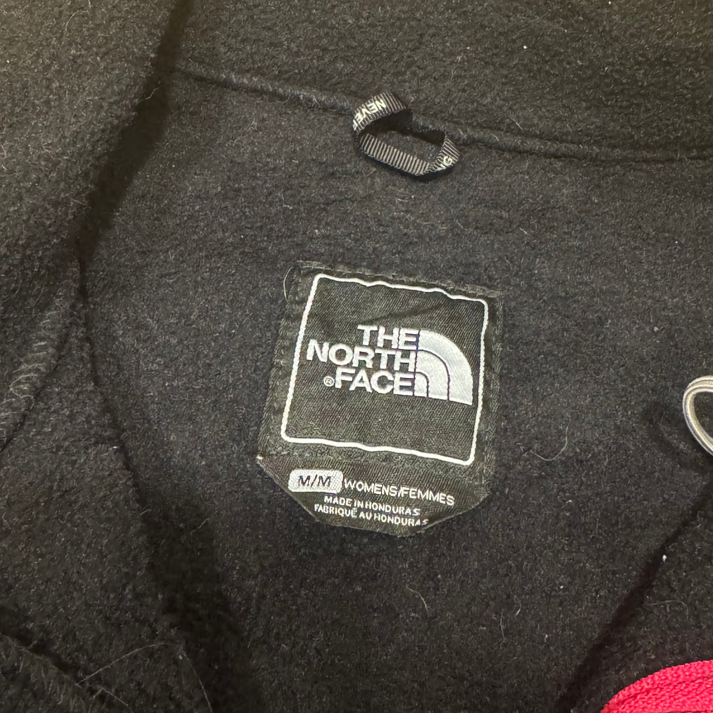 The North Face black women’s fleece jacket