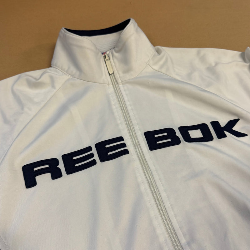 Detailansicht: Sourced limited accessories and clothes Reebok vintage white 00s track jacket – Logo, Nähte oder Material