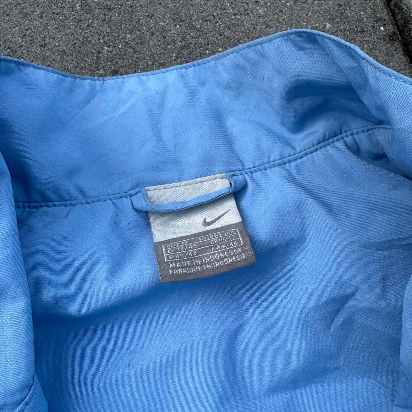 Vintage Nike lightweight blue track jacket