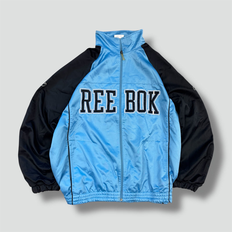 Sourced limited accessories and clothes Reebok 56 oversized skyblue track jacket – Secondhand Streetwear