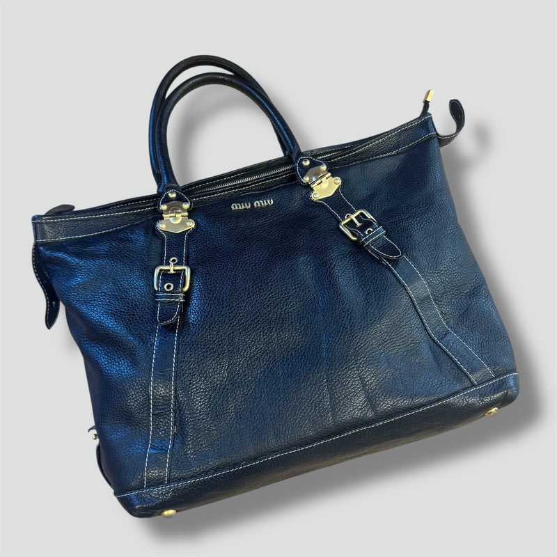 Sourced limited accessories and clothes Miu Miu vintage black leather handbag – Secondhand Streetwear