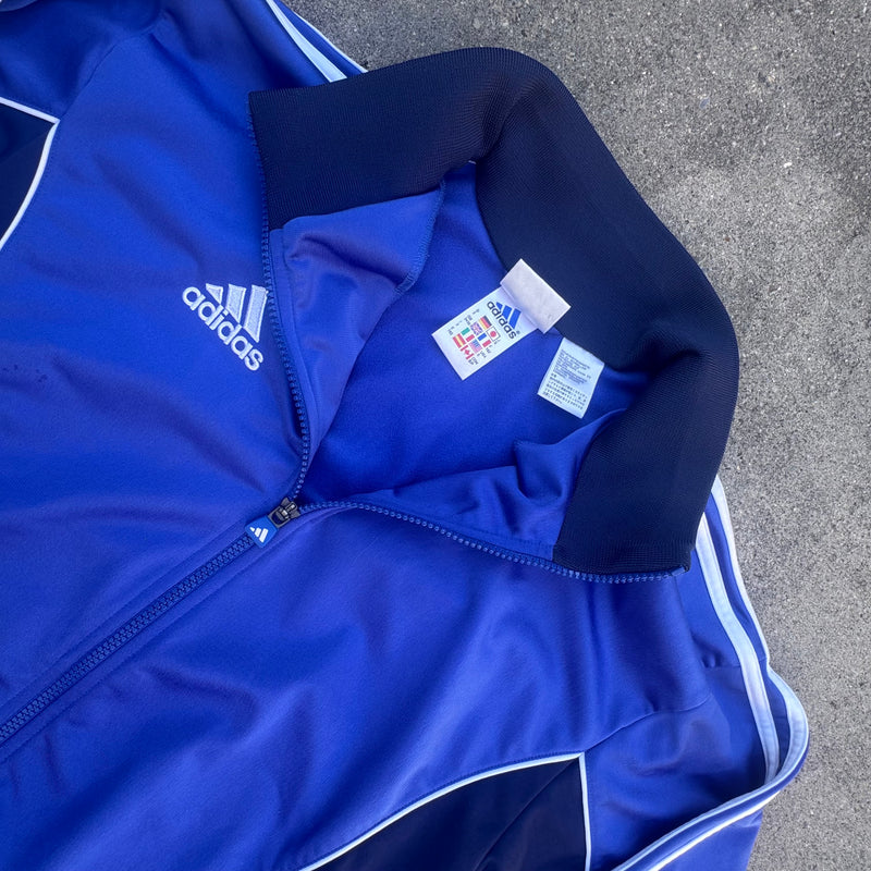 Detailansicht: Sourced limited accessories and clothes Adidas streetwear 00s blue track jacket – Logo, Nähte oder Material