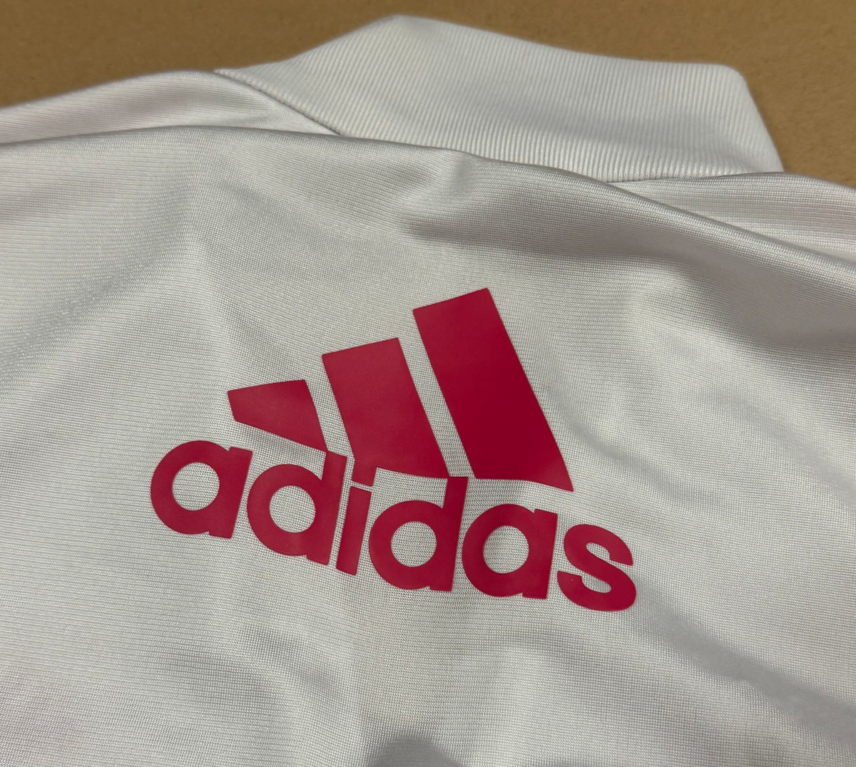 Adidas streetwear style y2k track jacket in white – Close-up 1