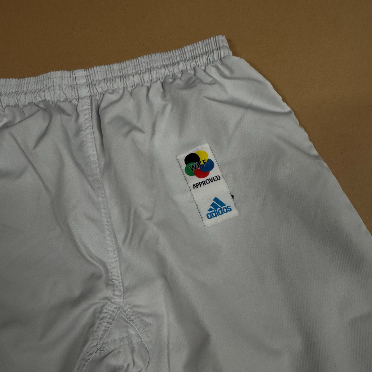 Adidas WKF Olympia baggy white track pants – Close-up 1