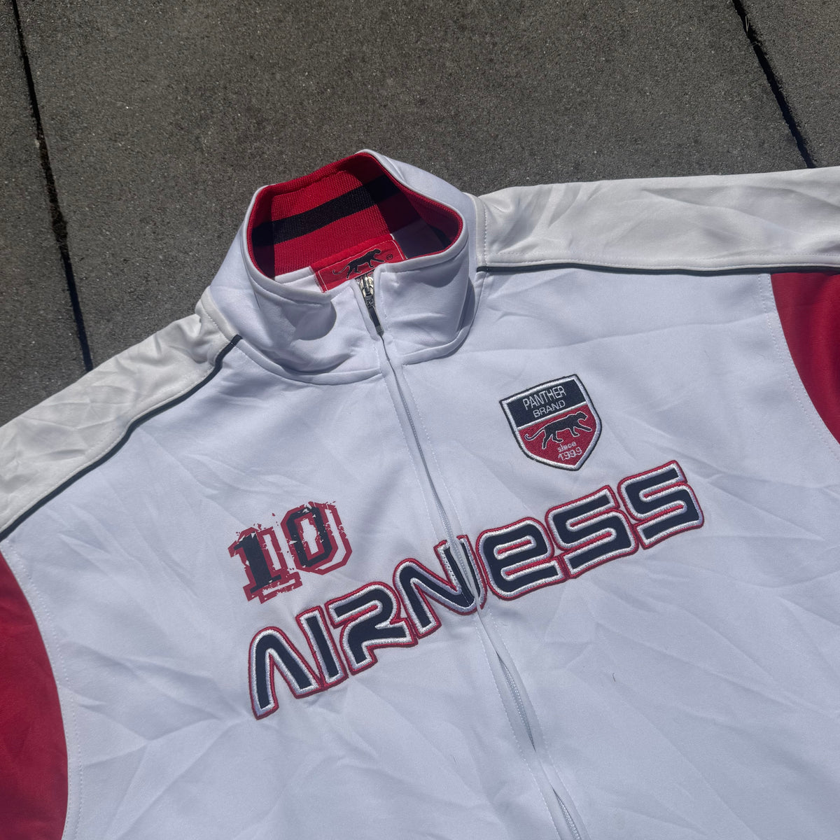 Airness Allstars white streetwear track jacket – Close-up 1