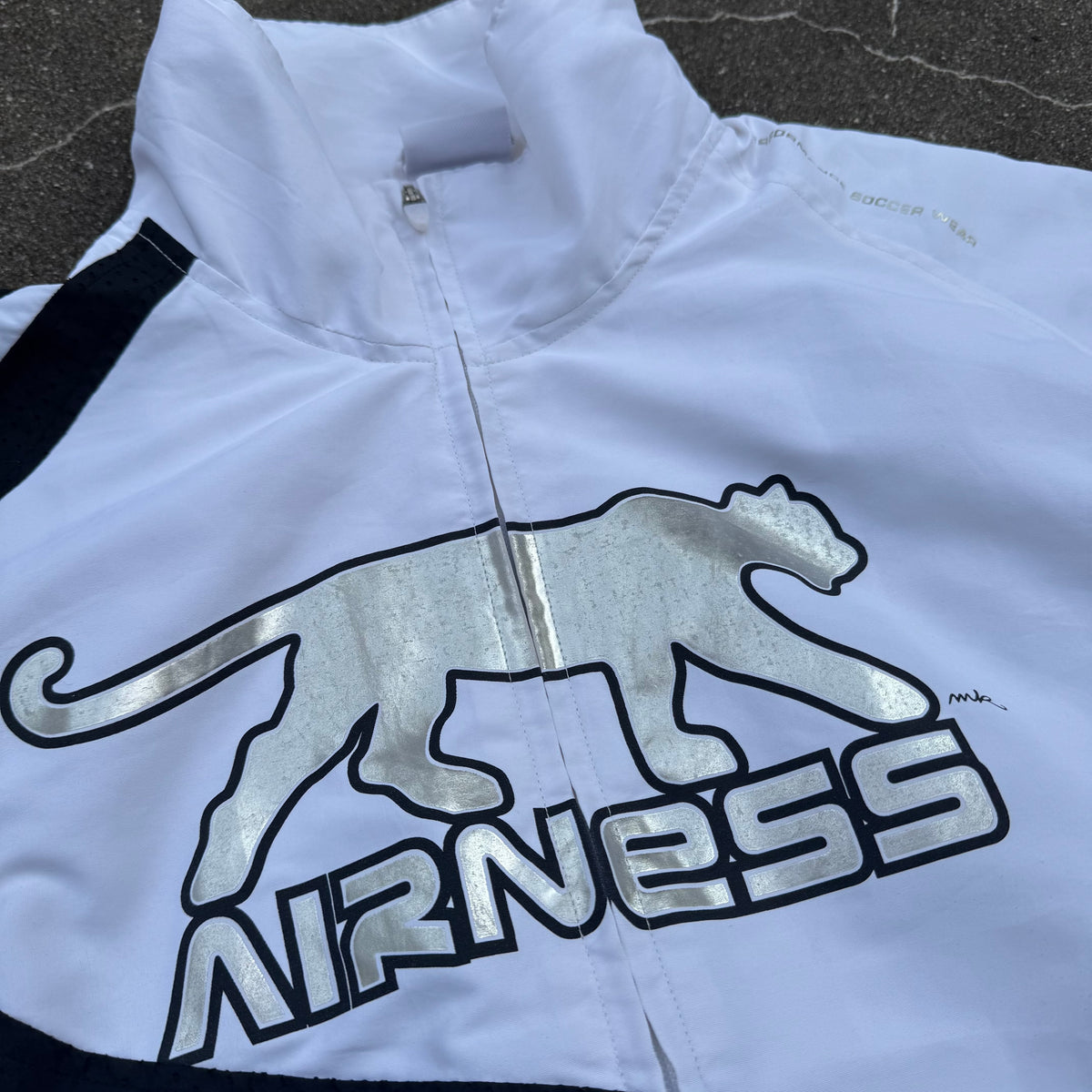 Airness silver panther streetwear track jacket – Close-up 1