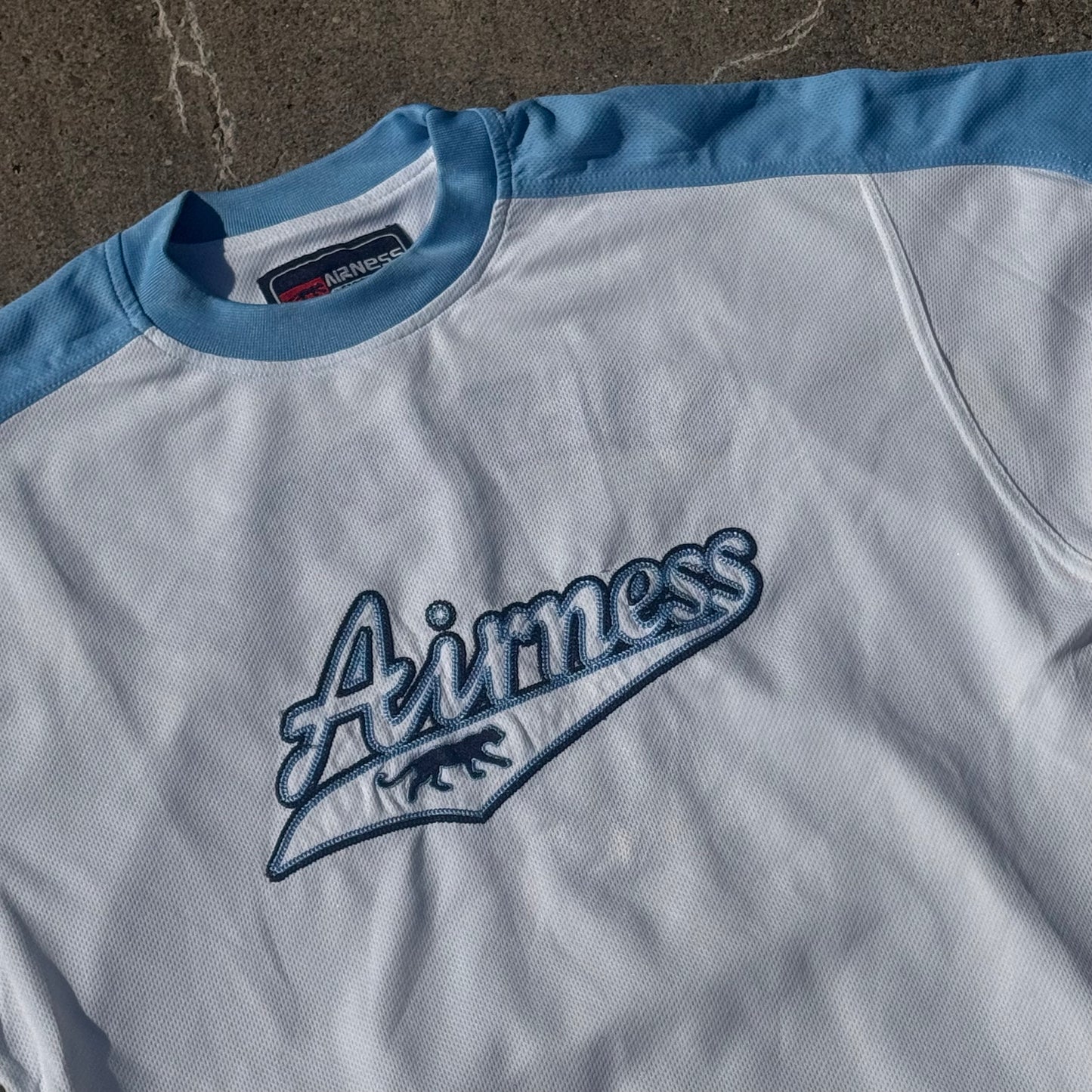 Airness Streetwear Only sports white T-shirt – Close-up 1