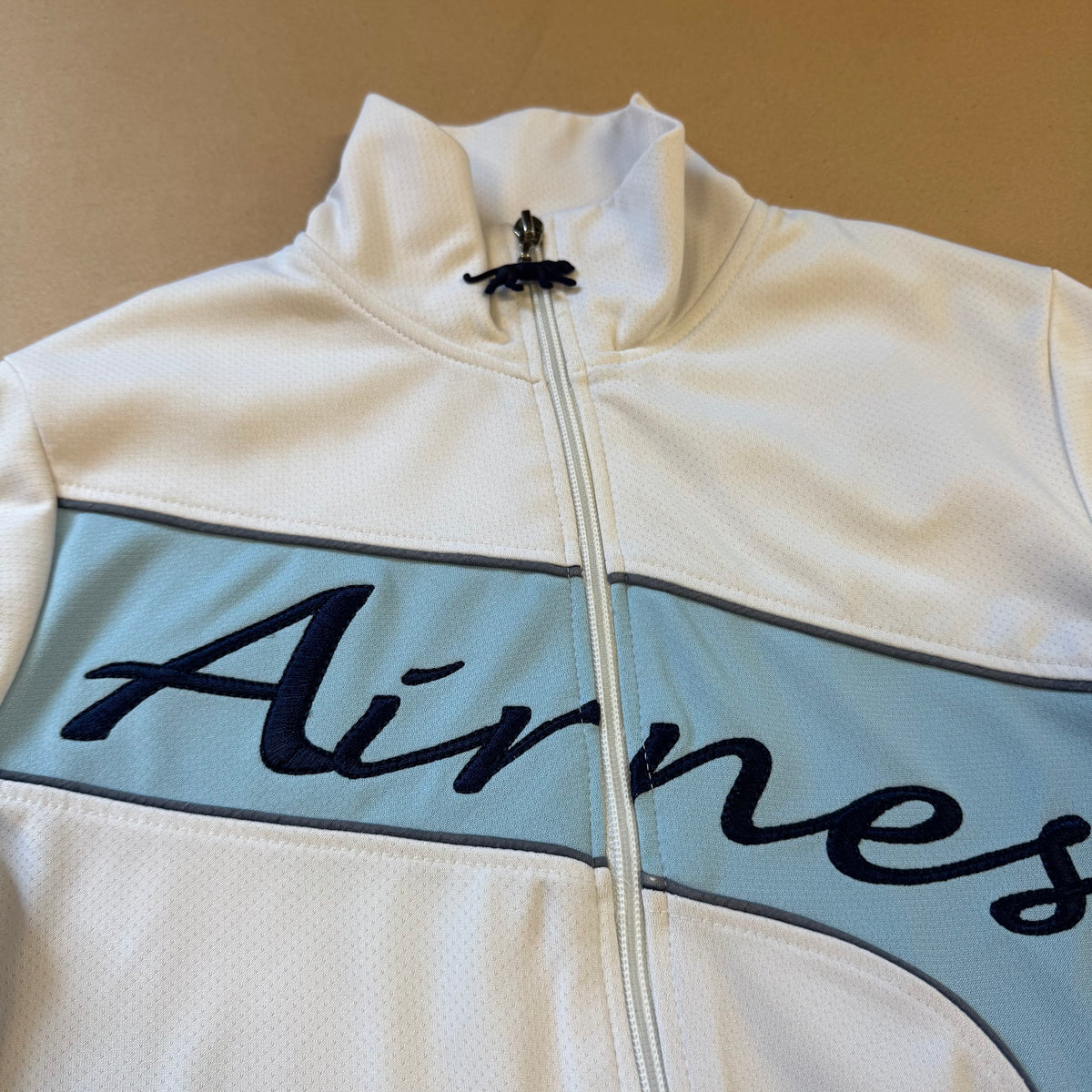 Airness streetwear style women’s track jacket – Close-up 1