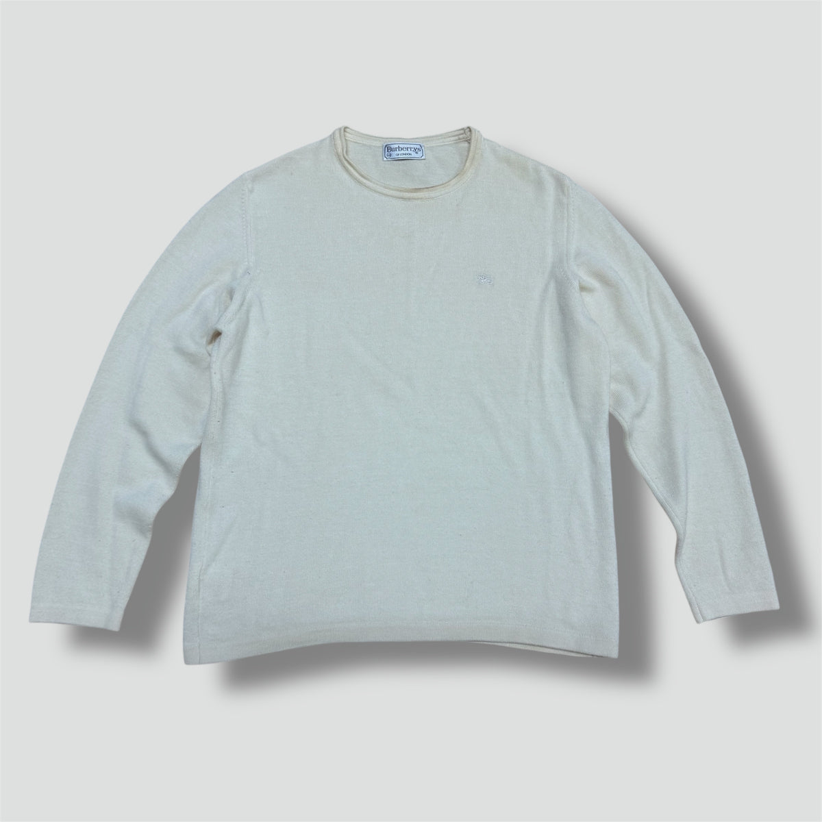 Burberry’s cream color women’s wool sweater